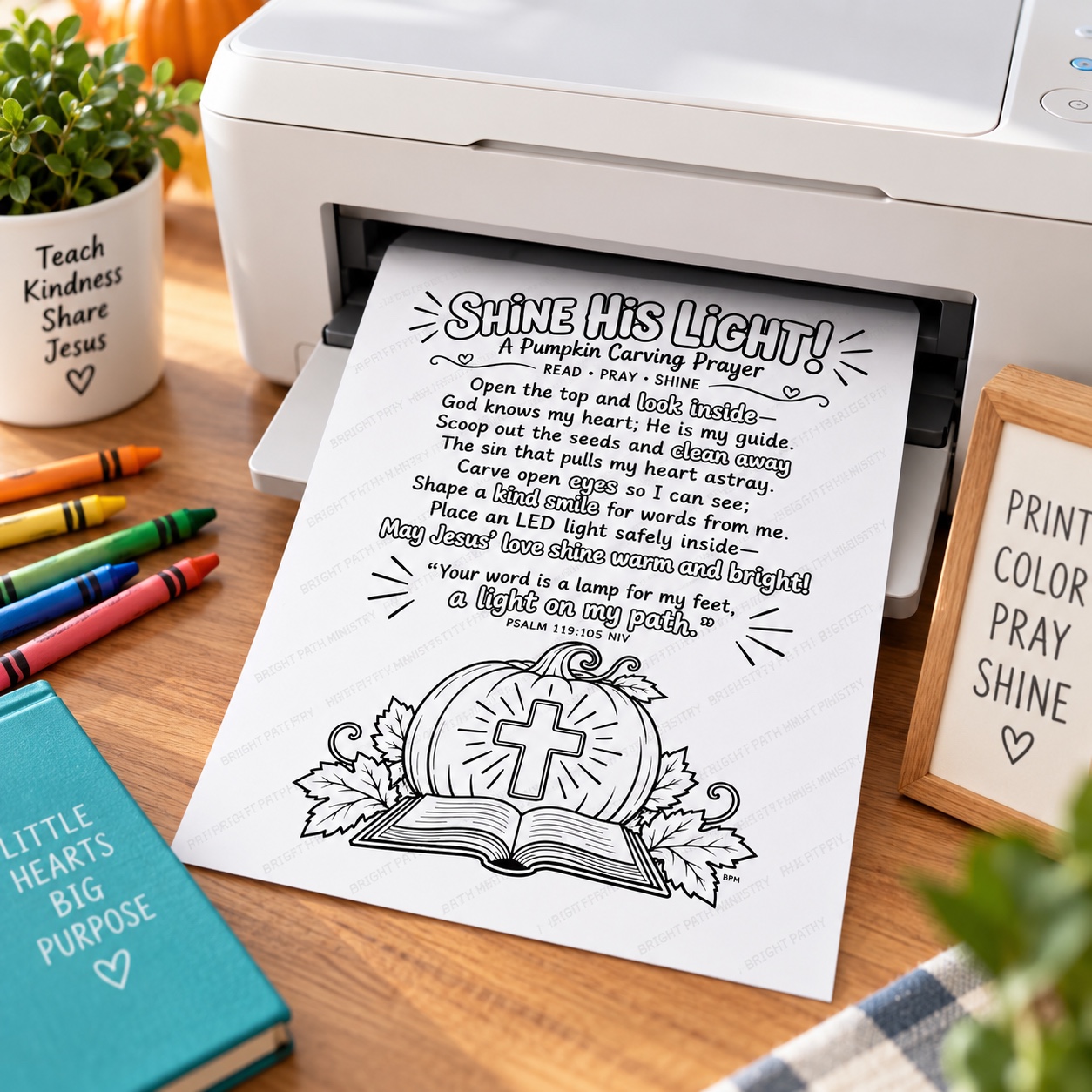 Shine His Light pumpkin carving prayer coloring page printing beside crayons, a Bible and fall decorations